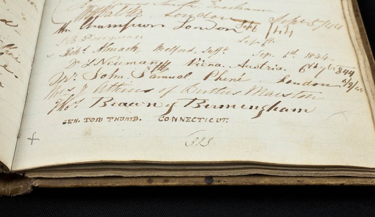 An open page (p313) of the visitor book with a number of signatures in a variety of handwriting, including, in small capitals at the foot, "Gen. Tom Thumb, Connecticut".